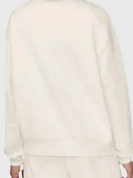 Back view of the Costco Esprit Sweatshirt in cream showing a cozy casual drape and neat stitching.