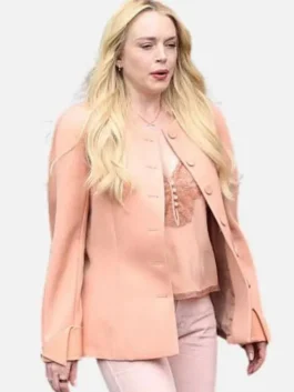 Front view of the coral pink wool Count My Lies Violet Lockhart Wool Jacket highlighting premium stitching.