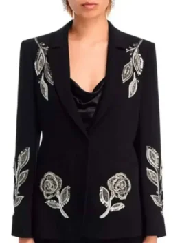Full front profile of the black suiting Dutton Ranch Annette Bening Floral Blazer highlighting three practical storage pockets.