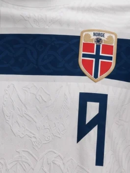 White and blue Erling Haaland Knotwork Football Jersey inspired by Viking and Norse Celtic knotwork celebrating Haaland's Norwegian football identity