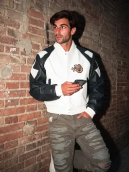 Full profile view of the black and white Ferran Torres Jacket detailing the spacious side pockets and fine stitching.
