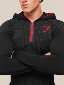 Black Gymshark Onyx Zip Hoodie showing the premium half zipper front and comfortable hooded collar.