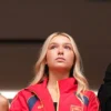 Red cotton Harper Beckham Intra Spain Jacket with snug elastic cuffs and full-length sleeves.