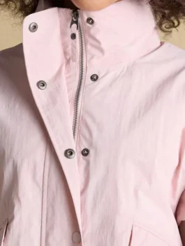 Close-up of Hove Pink Waterproof Windbreaker Jacket highlighting waterproof fabric, stitching, and premium craftsmanship