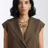 Front view of the brown suiting fabric In the City Danielle Olivera Brown Vest detailing the lapel collar and waist belt.