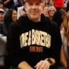 Black fleece Jason Sudeikis WNBA All-Star Game Hoodie featuring a soft hooded collar and pullover closure.