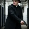 Sleek black wool Josh Stewart The Punisher Black Coat featuring a stand up collar and front button closure.