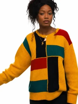 A cozy multicolor Keke Palmer The Burbs Colorblock Sweater crafted from premium knitted fabric.