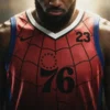 Red polyester LeBron James 76ers Spider-Man Jersey featuring a V neck collar and pullover style.