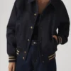 Closure view of Lennox Varsity Jacket highlighting the front fastening, quality stitching, and varsity construction