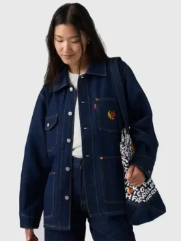 Dark blue denim Levi’s x Sky High Farm Goods Chore Jacket showcasing the classic shirt collar and functional button cuffs.