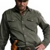 Front view of the grey cotton Luke Grimes Marshals Grey Shirt showcasing full length sleeves and clean chest pockets.