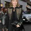 Close-up front view of the black cotton Margot Robbie Embroidered Jacket detailing the stand up collar and elegant embroidery.