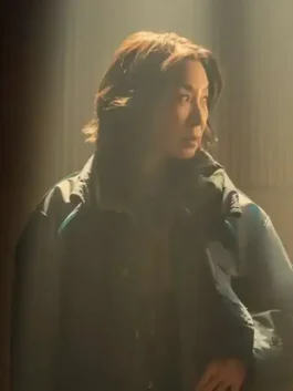 Close-up front profile of the blue parachute Blade Runner 2099 Michelle Yeoh Coat detailing the stand up collar and front zipper.