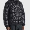 Model view of the black Moncler x Spiderman Padded Jacket showcasing the full luxurious fit of this iconic Moncler x Spider-Man collaboration piece
