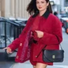 Full-length view of the red cotton Monica Barbaro New York City 2026 Jacket with neat outside pockets.