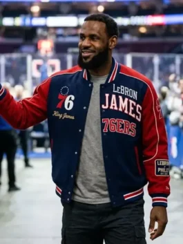 Navy blue and red LeBron James Philadelphia 76ers Varsity Jacket showcasing rib knitted cuffs and contrast PU leather sleeves.