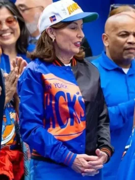 Kathy Hochul NY Knicks Victory Parade 2026 satin bomber jacket side view with glossy blue finish
