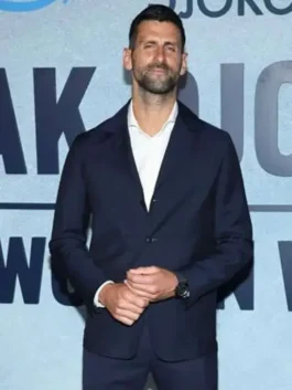 Close-up front view of the navy blue blazer from The Wolf In Winter Novak Djokovic Navy Suit highlighting the lapel collar and button front.