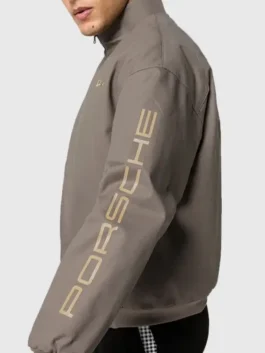 Model side view of the Porsche Legacy x PUMA Pepita Jacket showcasing the sleek silhouette and rib knitted cuffs.