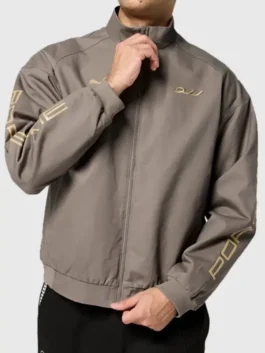 Full model view of the black, white, and stone grey Porsche Legacy x PUMA Pepita Jacket showing a modern casual drape.