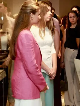 Side profile view of the pink cotton Princess Leonor Pink Blazer displaying the clean sleeve drape and structured shoulders.