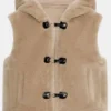Close-up front view of the beige shearling Ransom Canyon Heidi Grace Shearling Vest detailing the buckle closure and attached hood.