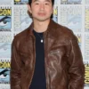 Full front view of the brown real leather Simu Liu ComicCon Brown Leather Jacket highlighting six functional storage pockets.
