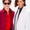 Close-up of the white suiting fabric SpiderMan Photocall NYC Zendaya Blazer detailing the lapel collar and button closure.