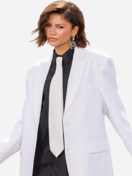 White suiting fabric SpiderMan Photocall NYC Zendaya Blazer showcasing full length sleeves and tailored white fit.