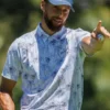 Close-up of the polyester fabric and half button design on the Stephen Curry ACC Palm Tree Polo Shirt.