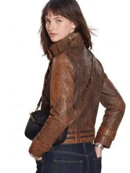 Front view of the brown distressed leather The Bride Premiere Mia Regan Leather Jacket showcasing full length sleeves and crisp stitching.