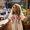 Full front profile of the white cotton The Five Star Weekend Regina Hall Floral Top highlighting the floral pattern and half length sleeves.