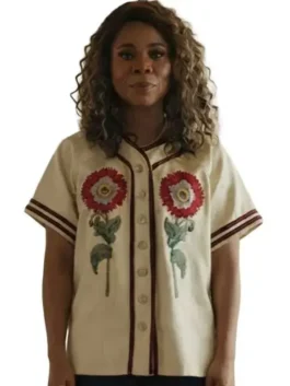 Front view of the white embroidered The Five Star Weekend Regina Hall Floral Top detailing the V neck collar and front button closure.