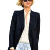 Front view of the black suiting fabric coat from The Odyssey 2026 Charlize Theron Blazer showcasing full sleeves and crisp seams.