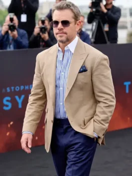 Soft beige cotton The Odyssey London Premier Matt Damon Blazer featuring a lapel collar and classic button closure.