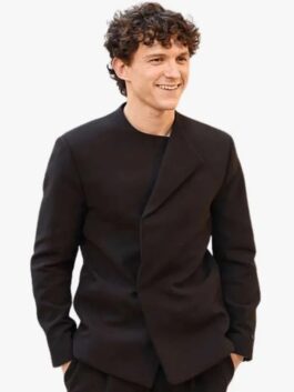 Sleek black suiting fabric The Odyssey New York Tom Holland Blazer featuring a collarless style and single button closure.