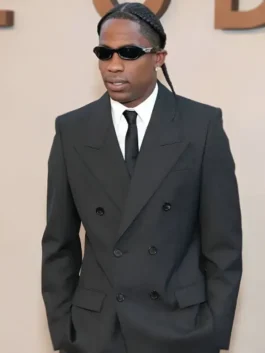 Full front profile of the black suit coat and matching trousers from The Odyssey New York Premiere Travis Scott Suit highlighting spacious storage pockets.