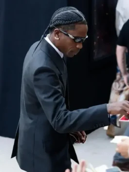 Back profile view of the black jacket and tailored pants from The Odyssey New York Premiere Travis Scott Suit displaying clean seams.