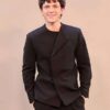 Front profile of the black suiting fabric jacket from The Odyssey New York Tom Holland Blazer showcasing full-length sleeves and crisp tailoring.