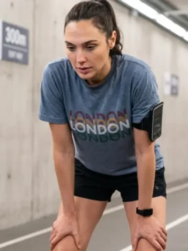 Close-up front profile of the grey polyester The Runner Gal Gadot London T-Shirt detailing the crew collar and fine stitching.