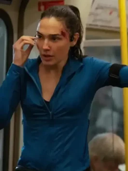 Close-up profile of the blue polyester The Runner Gal Gadot Jacket showing the high-quality stitching detail.
