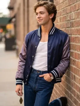 Front view of the navy blue satin The Shards Igby Rigney Varsity Jacket showcasing rib knitted cuffs and full length sleeves.