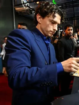 Blue suiting fabric Tom Holland The Odyssey Premiere Blazer featuring long sleeves and open hem cuffs.
