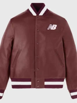 Front view of the US Open Coco Gauff NB Leather Jacket in burgundy leather with a snap tab button closure.
