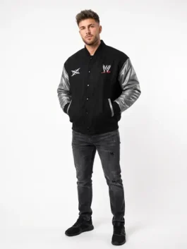 Black wool body with leather sleeves WWE x Ken Carson Varsity Jacket showcasing full length sleeves and rib knitted cuffs.