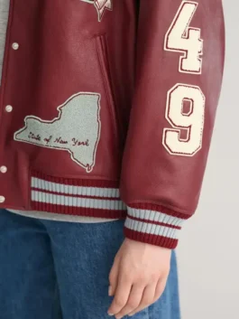 Front view of the Womens Printed Maroon Leather Varsity Jacket showcasing real leather construction and side entry pockets.