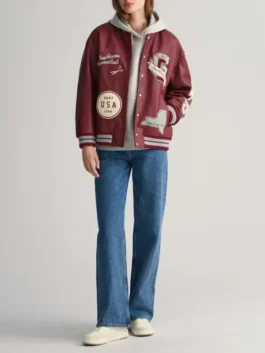 Full front profile of a model wearing the Womens Printed Maroon Varsity Jacket paired with casual streetwear.
