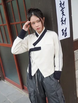 Front view of the white Hwarang Hanbok Jacket from YBSY putting the full clean and elegant Hwarang warrior Hanbok inspired design on bold display