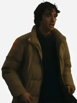 Beige parachute Jumanji Open World Alex Wolff Puffer Jacket featuring a stand up collar and dual zipper button closure.